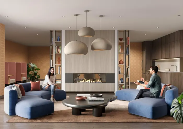 Artist’s rendering of the Matteō social lounge with blue sofas, a fireplace and pendant lights
