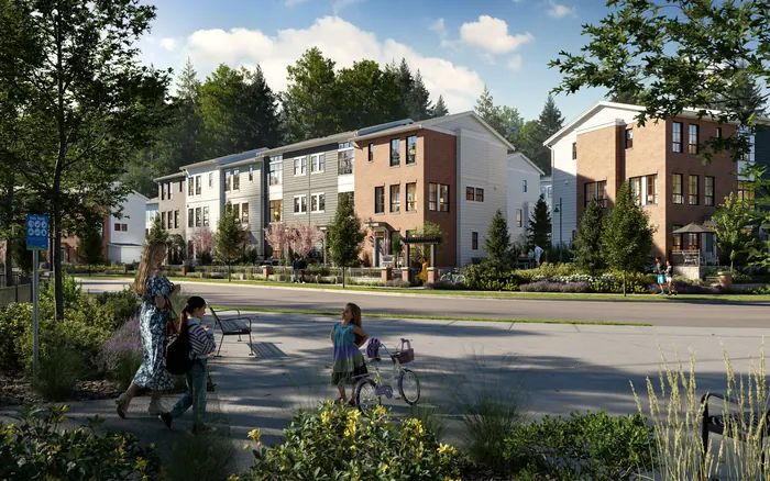 Artist’s rendering of Rail District townhomes along a tree-lined street with people walking and cycling