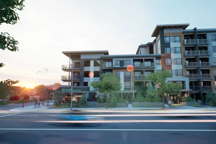Artist’s rendering of Walnut Park at dusk: a six-storey building in brick and dark panel with lit shopfronts at street level and traffic passing in front